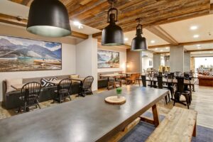 Coffee bar and seating area at Happy Camper Cafe in Banff